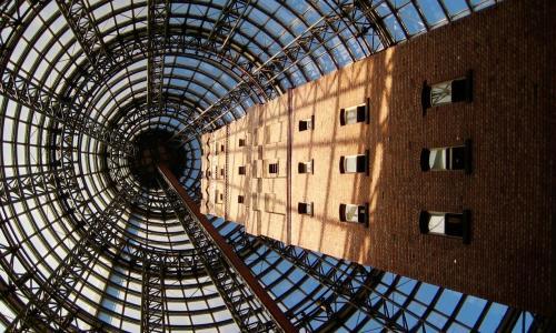 mental cage cone structure and brick building